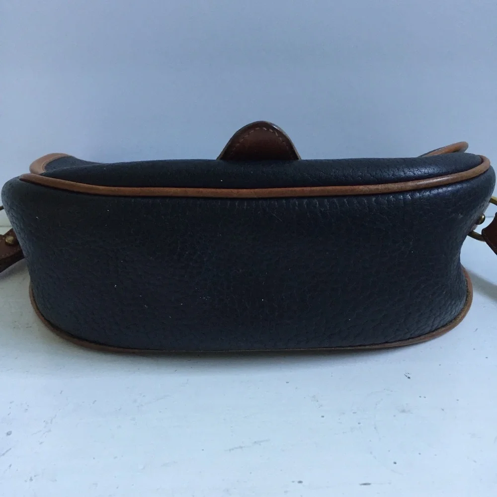 Vintage Dooney  & Bourke  Saddle Cross body Bag